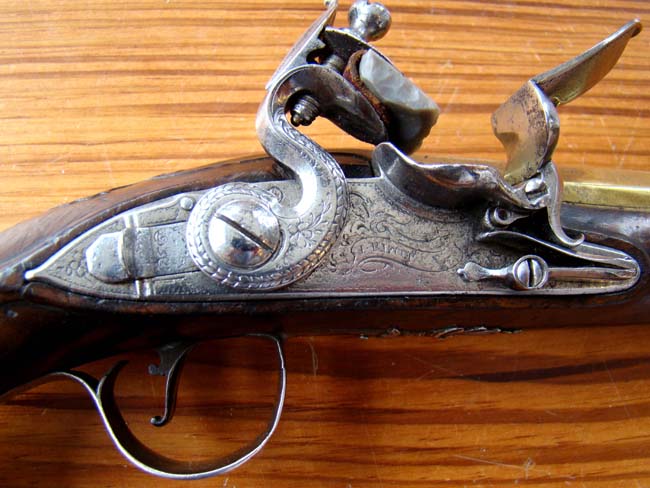 A Revolutionary War period silver mounted brass barreled flintlock Naval officer's pistol — image 4